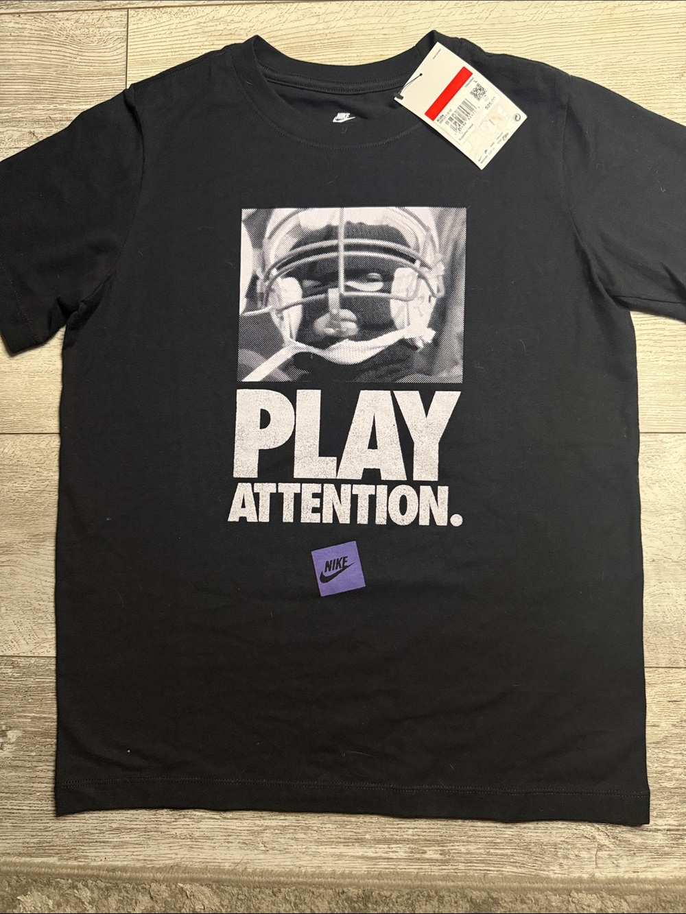 Nike Black Graphic Tee with White Print and Purple Logo Accent